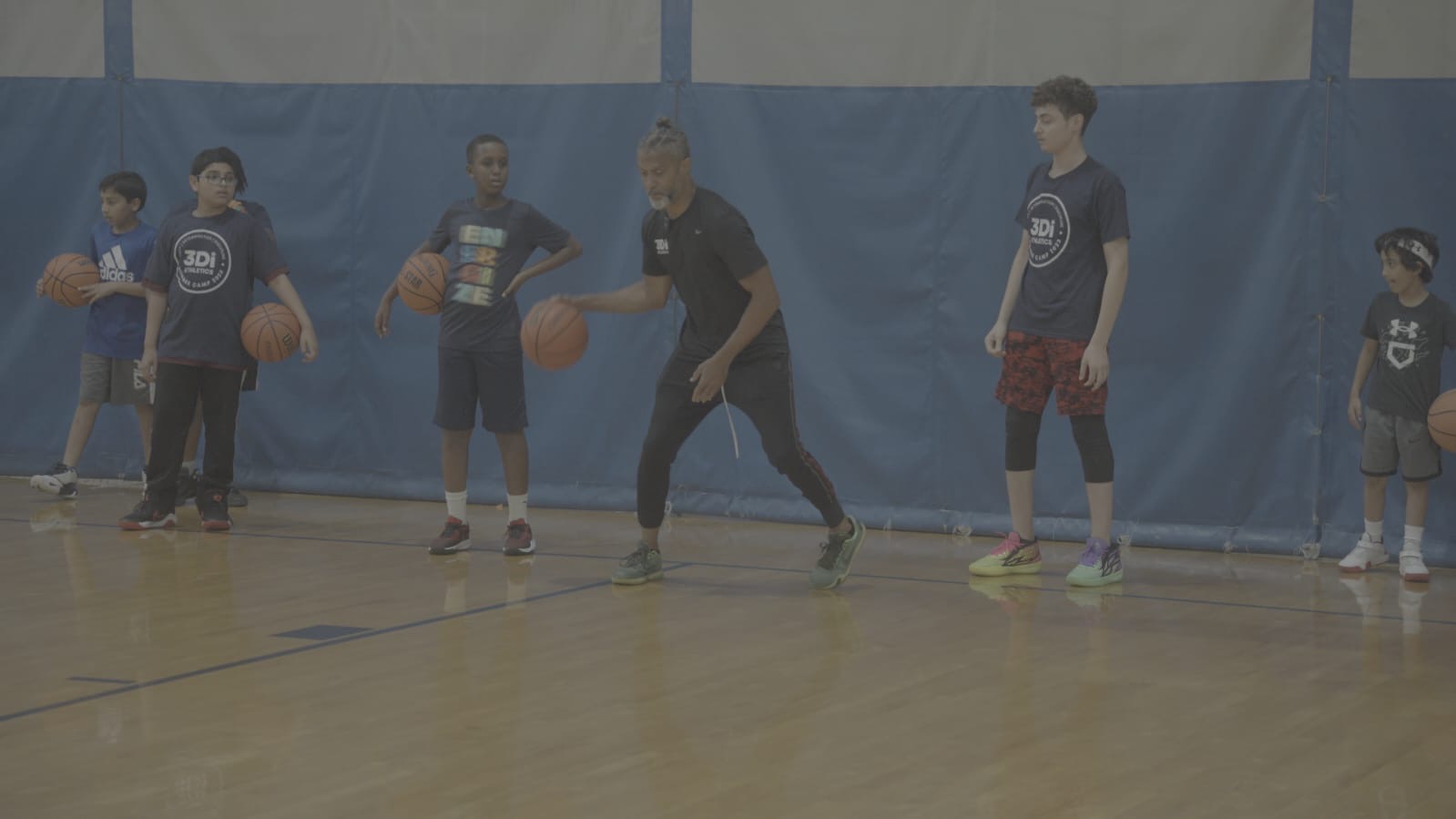 Mahmoud Abdul-Rauf coaching at a 3Di camp